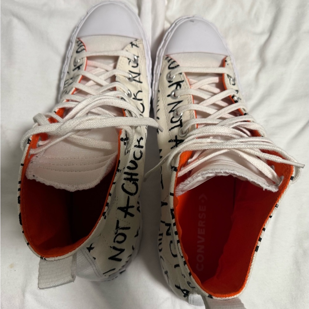 Converse White High-Top Sneakers with Orange Lining and Handwritten Graphic